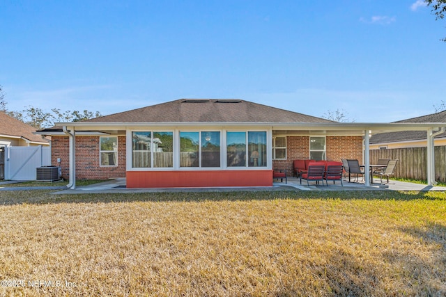 back of house featuring cooling unit, a yard, outdoor lounge area, and a patio