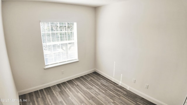 empty room featuring hardwood / wood-style floors