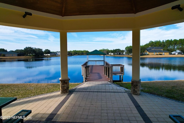 dock area featuring a gazebo and a water view