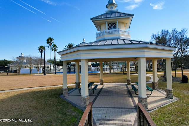 view of home's community with a yard and a gazebo