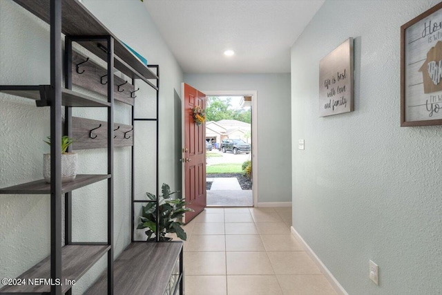 entryway featuring light tile patterned floors