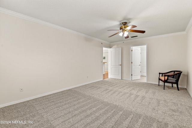 unfurnished room featuring light carpet, ornamental molding, and ceiling fan