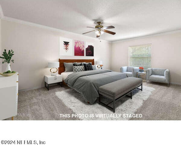 bedroom featuring crown molding, ceiling fan, and carpet