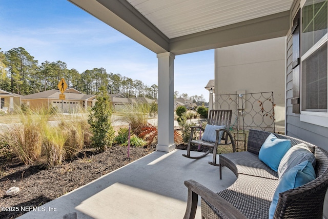 view of patio featuring a porch