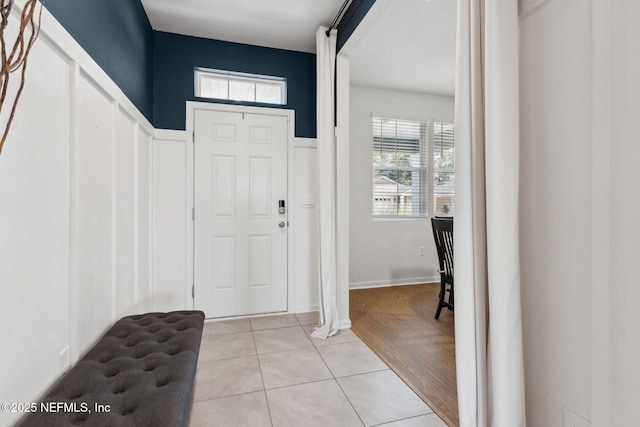 entryway featuring light tile patterned floors