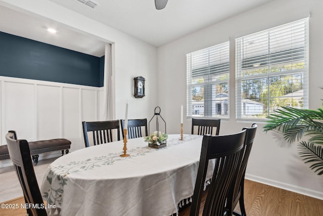 dining area featuring light wood-type flooring