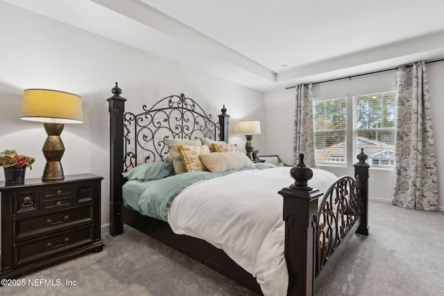 bedroom featuring light colored carpet