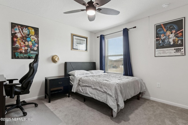 bedroom featuring light carpet and ceiling fan