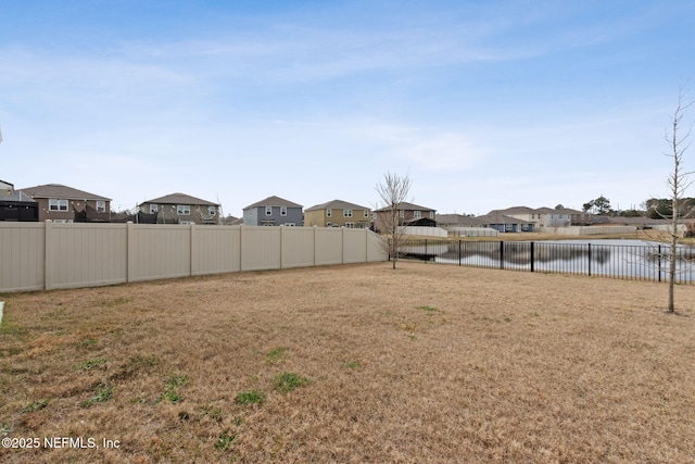 view of yard featuring a water view