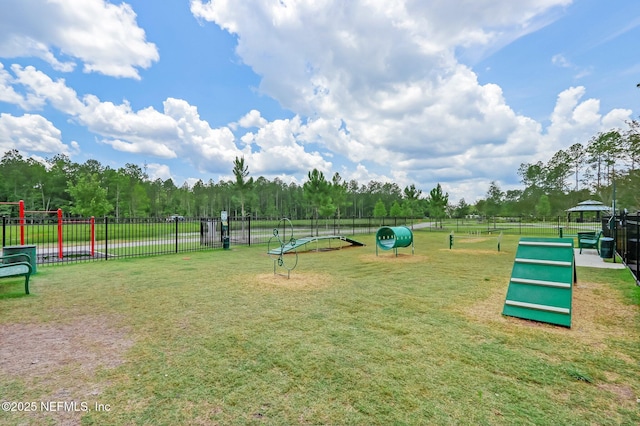 view of home's community with a yard