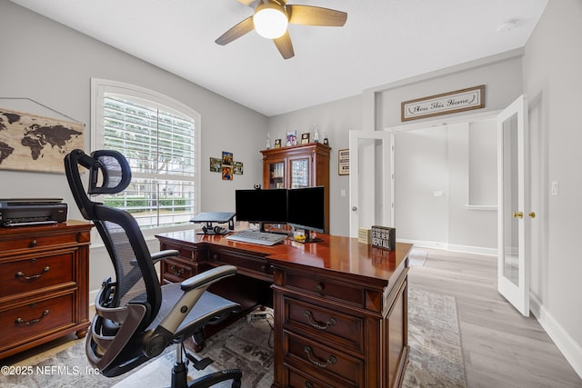 office area featuring ceiling fan and light hardwood / wood-style floors