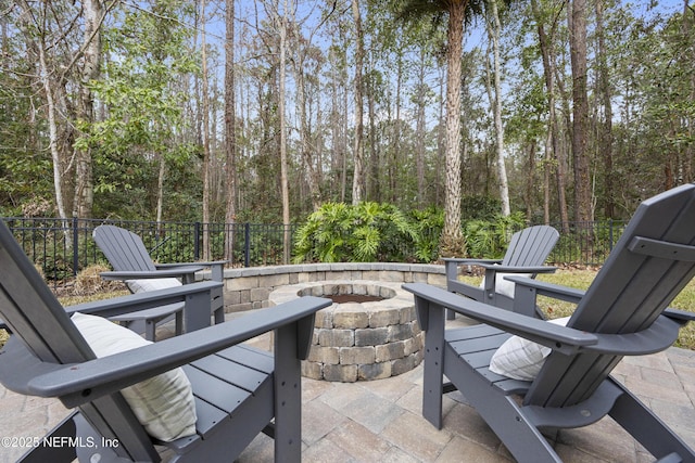 view of patio with an outdoor fire pit