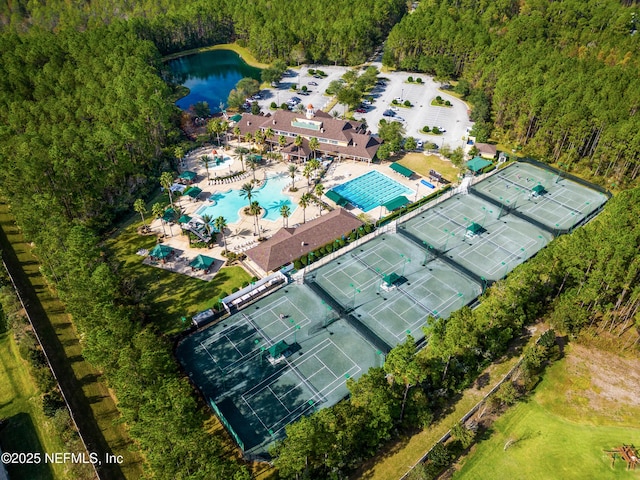 birds eye view of property featuring a water view