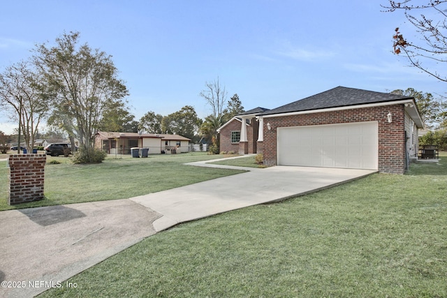 view of front of house with a garage and a front yard