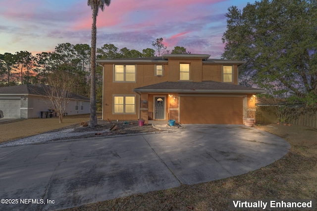 view of front of property featuring a garage