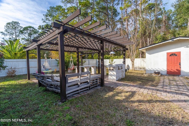 view of yard with a pergola