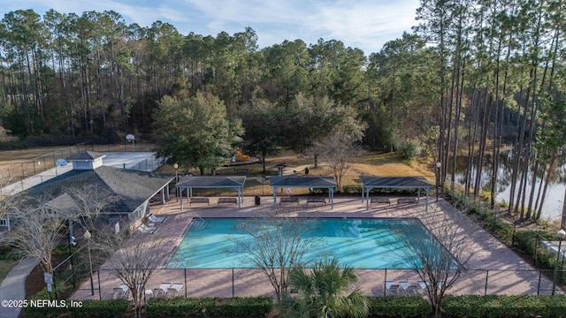 view of pool with a gazebo and a water view