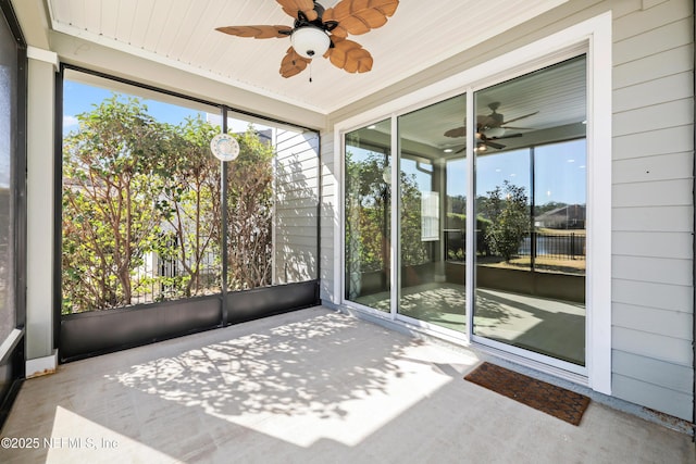 unfurnished sunroom with a wealth of natural light