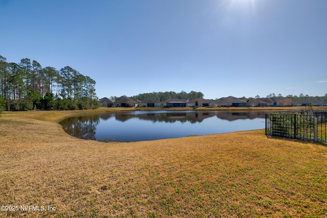 property view of water with fence