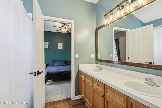 bathroom featuring vanity and ceiling fan