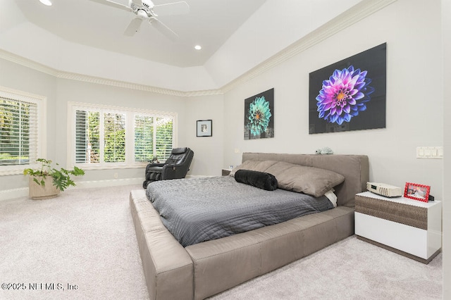 bedroom featuring baseboards, recessed lighting, a raised ceiling, and light colored carpet