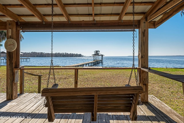 wooden terrace with a water view