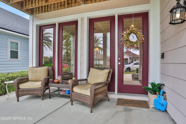 property entrance with covered porch