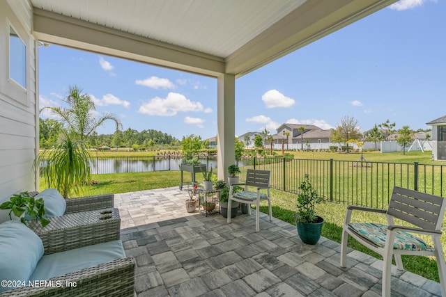 view of patio / terrace with a water view