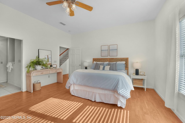 bedroom featuring ceiling fan and light wood-type flooring