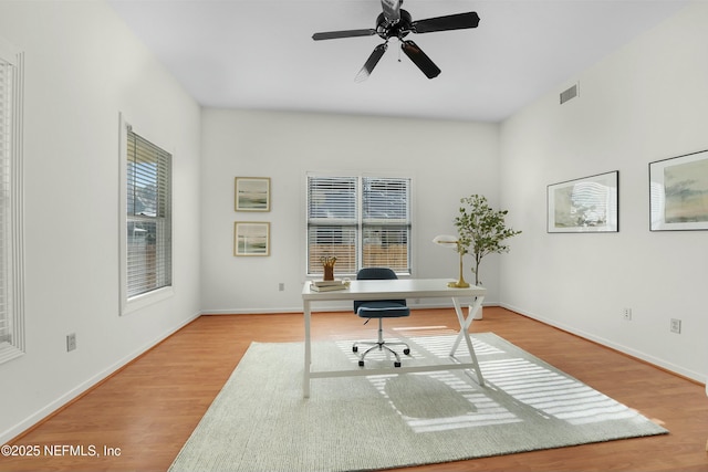 home office featuring ceiling fan and light wood-type flooring