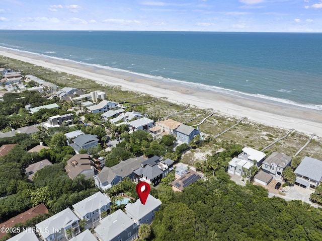 bird's eye view featuring a view of the beach and a water view