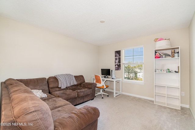 carpeted living room with a textured ceiling