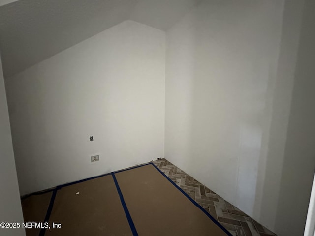 bonus room featuring lofted ceiling