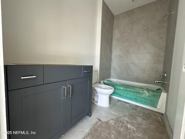 bathroom featuring tile patterned flooring, shower / tub combination, and toilet