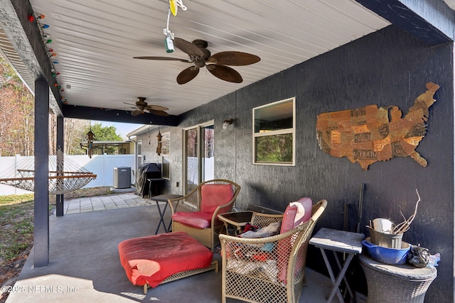 view of patio featuring ceiling fan, a grill, and central AC unit