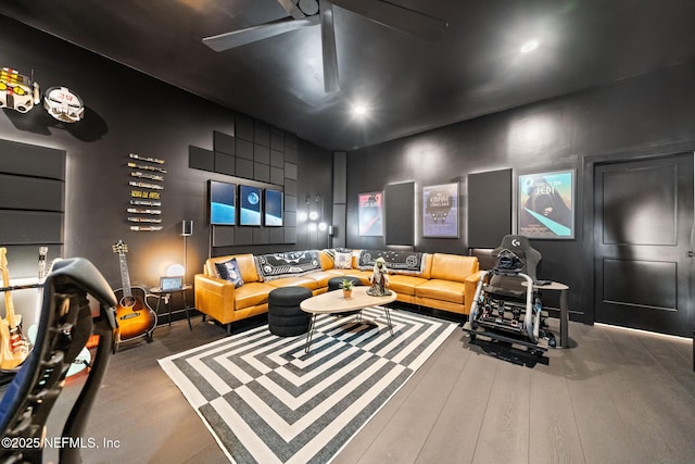 interior space featuring hardwood / wood-style flooring and ceiling fan