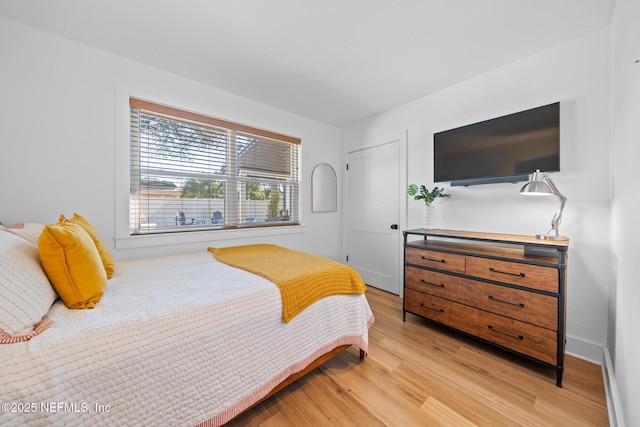 bedroom featuring light hardwood / wood-style floors