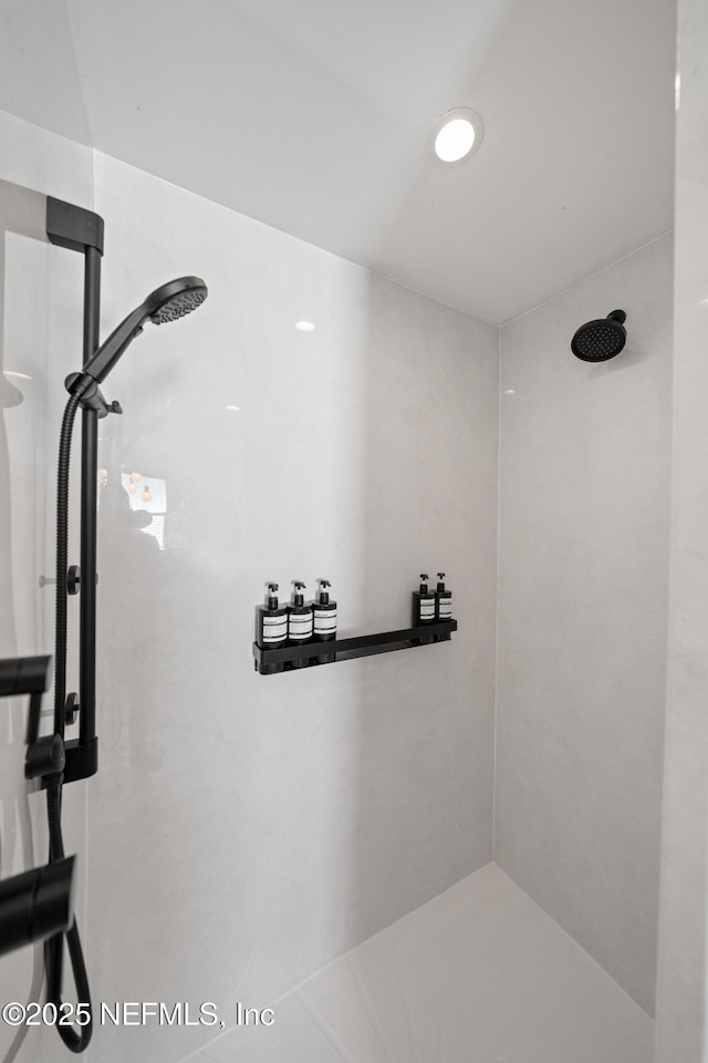 interior space with a tile shower