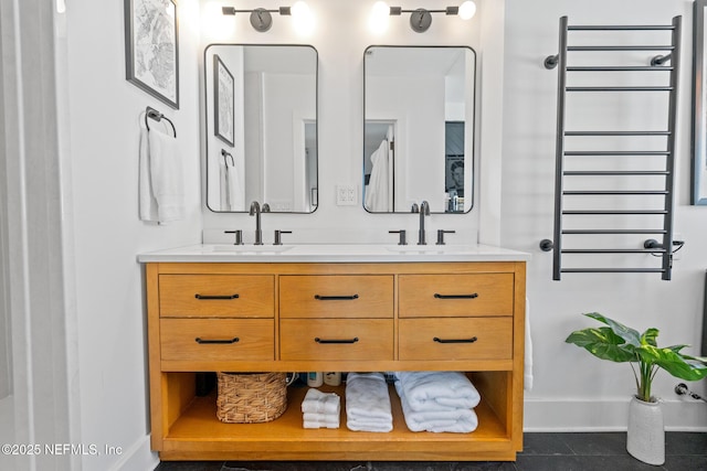 bathroom with vanity and radiator heating unit