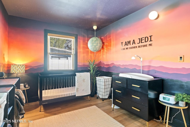 bedroom with wood-type flooring