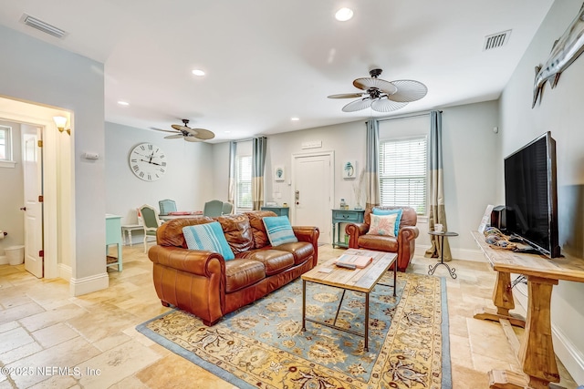 living room with ceiling fan