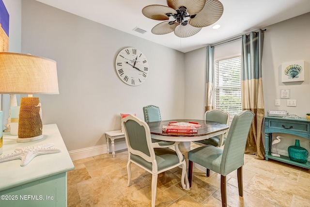 dining area featuring ceiling fan