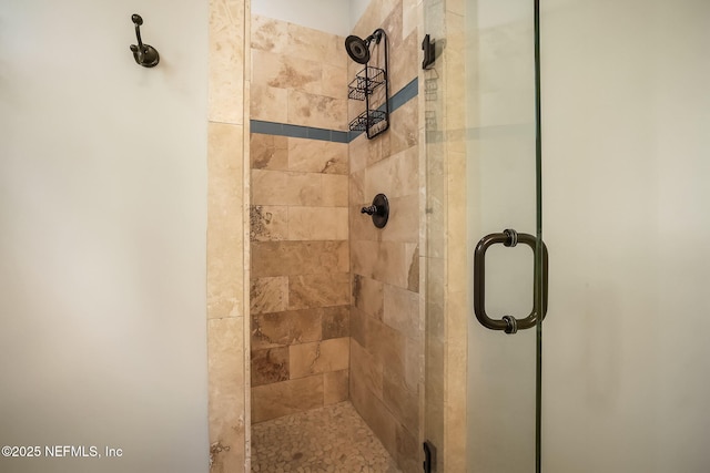 bathroom featuring an enclosed shower