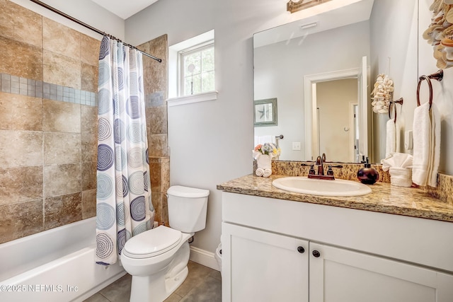 full bathroom with shower / bathtub combination with curtain, vanity, tile patterned floors, and toilet