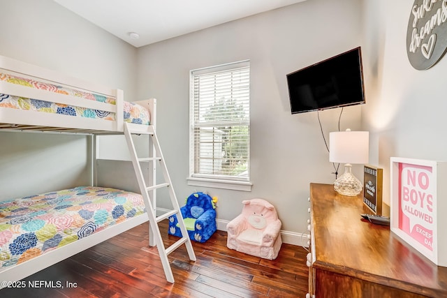 bedroom featuring dark hardwood / wood-style flooring