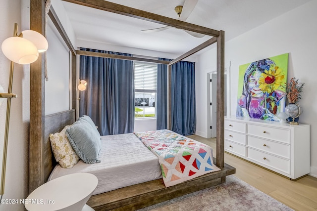 bedroom featuring ceiling fan and light wood-type flooring