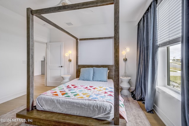 bedroom featuring hardwood / wood-style flooring