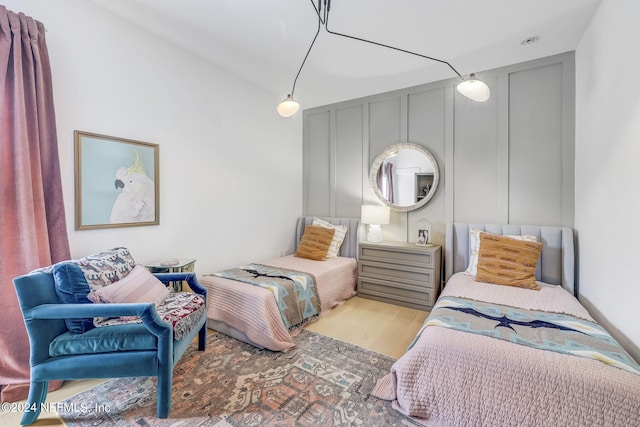 bedroom featuring light wood-type flooring