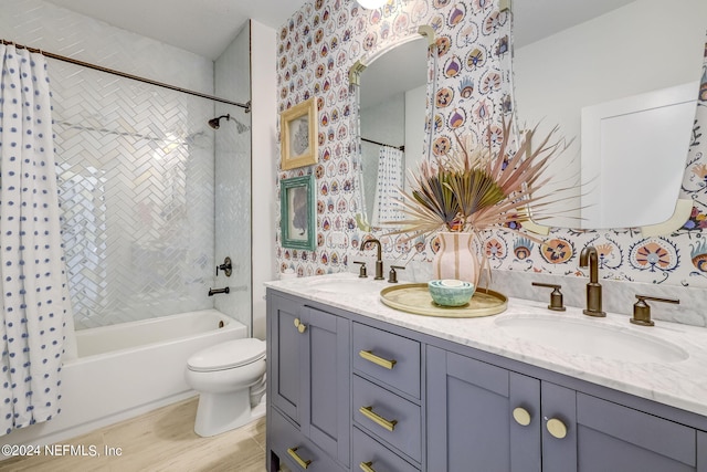 full bathroom featuring vanity, toilet, and shower / bath combo with shower curtain