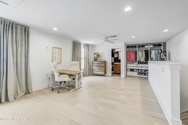 interior space featuring ceiling fan and light hardwood / wood-style floors